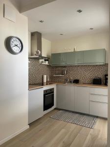 Kuchyňa alebo kuchynka v ubytovaní Baltica Sea Apartment