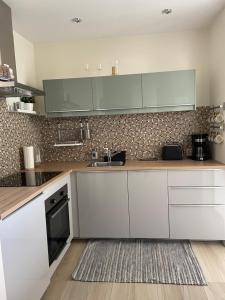 Kuchyňa alebo kuchynka v ubytovaní Baltica Sea Apartment