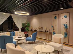 Posezení v ubytování Aquila Al Hamra Hotel