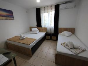 Postel nebo postele na pokoji v ubytování Casa Aura Costinești