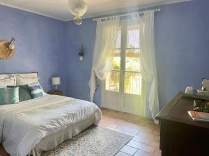 Postel nebo postele na pokoji v ubytování Maison Antonia