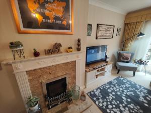 TV i/ili zabavni centar u objektu Frankland - Emsworth Harbour 3 Bedroom House