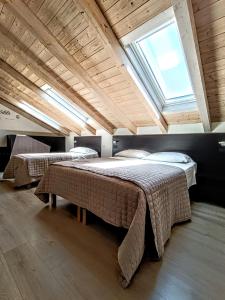 Postel nebo postele na pokoji v ubytování Il B&B di PIAZZA MOTTA