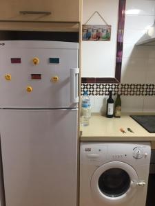 Kuchyň nebo kuchyňský kout v ubytování Apartamento Tarifamar con piscina y aparcamiento