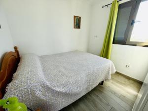 Łóżko lub łóżka w pokoju w obiekcie A46 - Atalaya - 2004 Finestrat s.l.