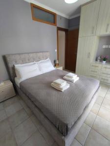 Posteľ alebo postele v izbe v ubytovaní Konomi Residence-Marilena Apartment