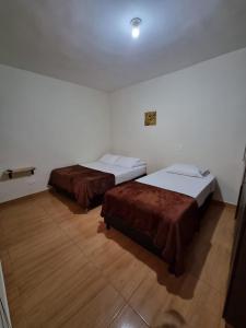 Postel nebo postele na pokoji v ubytování HOSPEDAJE EN ESPLENDOR