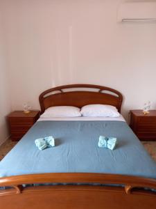 Posteľ alebo postele v izbe v ubytovaní Casa vacanze Blu Taormina