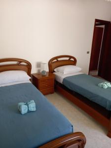 Posteľ alebo postele v izbe v ubytovaní Casa vacanze Blu Taormina