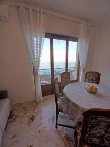 Posedenie v ubytovaní Casa vacanze Blu Taormina