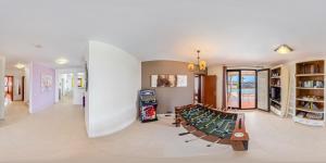 a large room with a pool table in it at Villa Sunset Faro Deluxe & Spa Pool in Playa Blanca