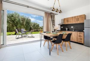 A kitchen or kitchenette at AVGOUSTIDIS APARTMENTS