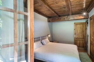 Posteľ alebo postele v izbe v ubytovaní Casa Es Pletieus by Totiaran