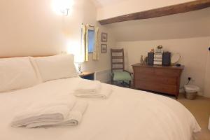 Ένα ή περισσότερα κρεβάτια σε δωμάτιο στο Stanton Cottage, Youlgrave Nr Bakewell