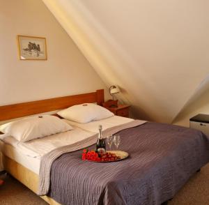 Postel nebo postele na pokoji v ubytování Hotel Karkonosze