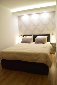 Posteľ alebo postele v izbe v ubytovaní Zagreb4you Apartments