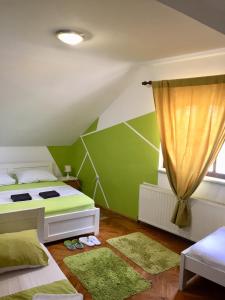 Postel nebo postele na pokoji v ubytování Hostel Lega House