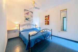 Ένα ή περισσότερα κρεβάτια σε δωμάτιο στο Is Traias home holidays