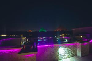 a night scene with lights and lights at night at Giza Pyramids Inn in Cairo
