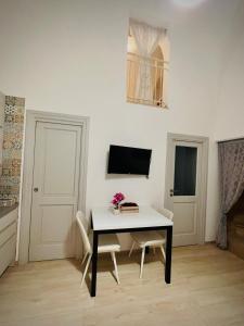 TV a/nebo společenská místnost v ubytování A casa di Chloe