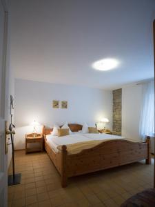 Postel nebo postele na pokoji v ubytování Gästehaus Stadtmitte