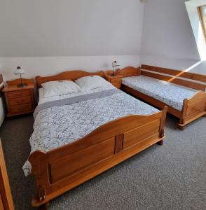 Postel nebo postele na pokoji v ubytování Hotel Karkonosze