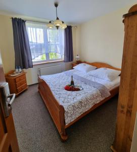 Postel nebo postele na pokoji v ubytování Hotel Karkonosze