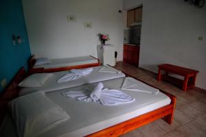 Posteľ alebo postele v izbe v ubytovaní White Rock Apartments