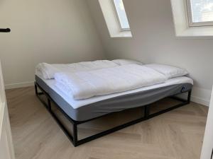 Postel nebo postele na pokoji v ubytování Luxe vakantiewoning in Domburg, Vaandragerstraat