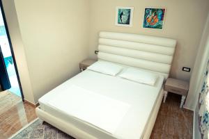 Voodi või voodid majutusasutuse Hotel Magic toas