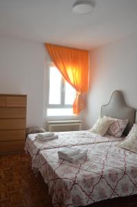 Ένα ή περισσότερα κρεβάτια σε δωμάτιο στο La casa de Laly