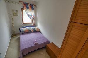 Postel nebo postele na pokoji v ubytování Apartmani Ivana