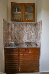 Kuchyň nebo kuchyňský kout v ubytování Apartmani Ivana + 37 fotografií