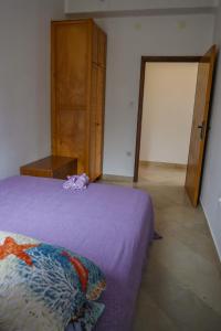 Postel nebo postele na pokoji v ubytování Apartmani Ivana