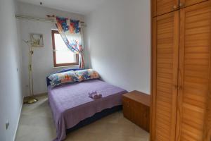Postel nebo postele na pokoji v ubytování Apartmani Ivana