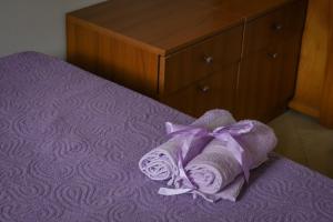 Postel nebo postele na pokoji v ubytování Apartmani Ivana