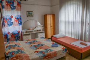 Postel nebo postele na pokoji v ubytování Apartmani Ivana