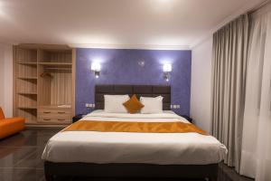 Ένα ή περισσότερα κρεβάτια σε δωμάτιο στο Airport View Hotel