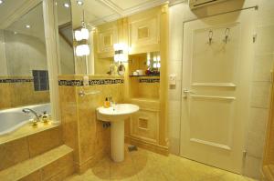 a bathroom with a sink and a toilet and a tub and a sink at VILLA MARJAN - 3 bdr, 3 bath, parking in Split