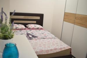 Postel nebo postele na pokoji v ubytování Apartman Maja