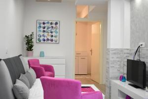 TV a/nebo společenská místnost v ubytování Apartman Maja