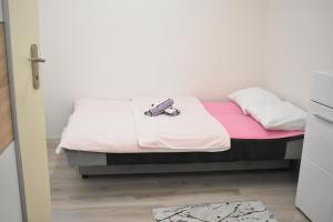 Postel nebo postele na pokoji v ubytování Apartman Maja