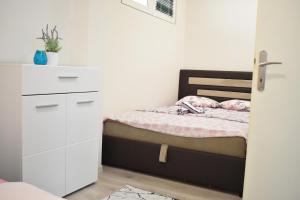 Postel nebo postele na pokoji v ubytování Apartman Maja