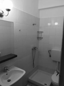 Koupelna v ubytování Apartments Giotis