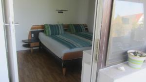 Posteľ alebo postele v izbe v ubytovaní Appartement am Strand