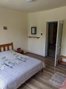 Postel nebo postele na pokoji v ubytování Tulipan Haz