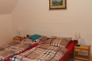 Postel nebo postele na pokoji v ubytování Berghof - horská chata