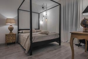 Posteľ alebo postele v izbe v ubytovaní Dimore D'Avalos Boutique bed & breakfast