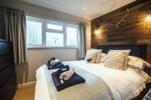 Un pat sau paturi într-o cameră la The Annexe - Stoke Fleming