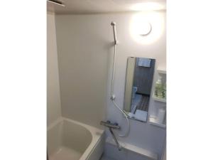 a bathroom with a shower and a sink at Guest House Nusa - Vacation STAY 12652 in Kushiro